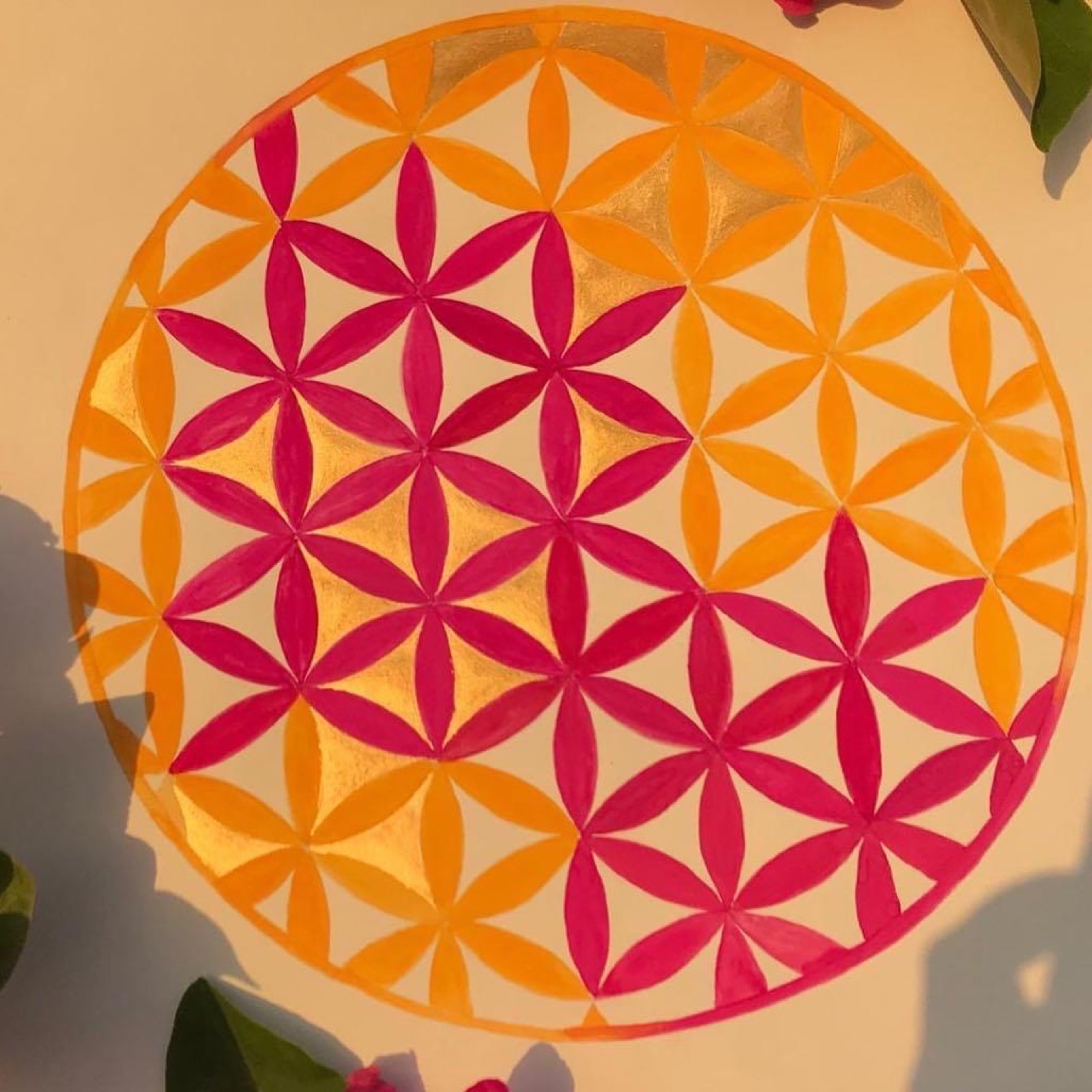 Flower of life geometric painting in rose, saffron and gold